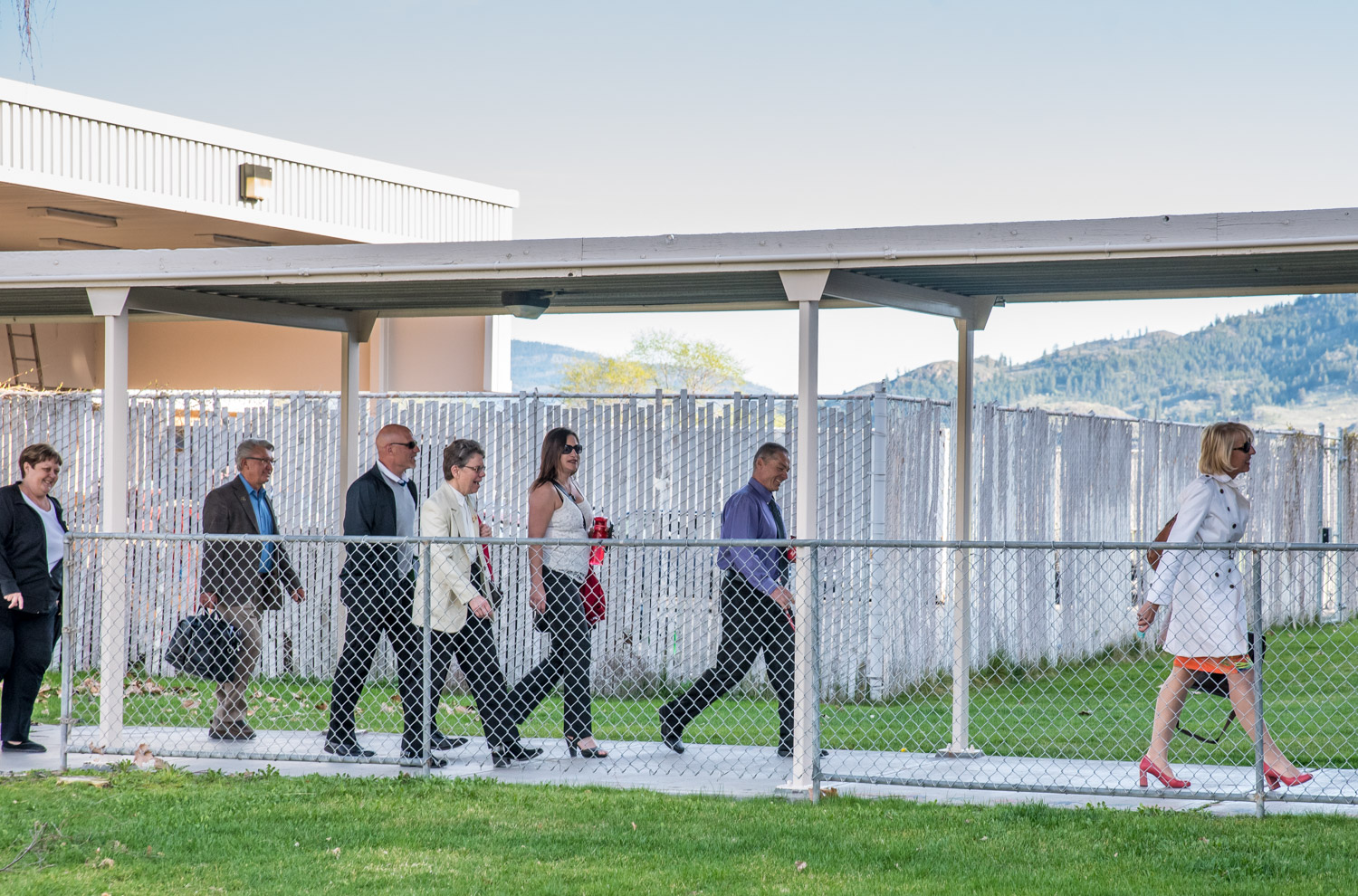 All the school trustees arrived together, except for June Harrington, who came separately. They slipped in by the gymnasium entrance, avoiding the crowd at the theatre door. (Richard McGuire photo)