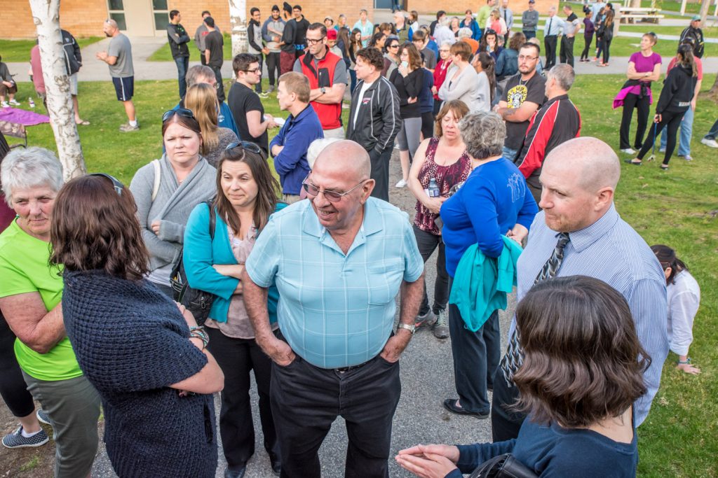 People began lining up outside the Osoyoos Community Theatre nearly two hours before the meeting to be assured of getting a seat. Many people didn't make it into the theatre. (Richard McGuire photo)