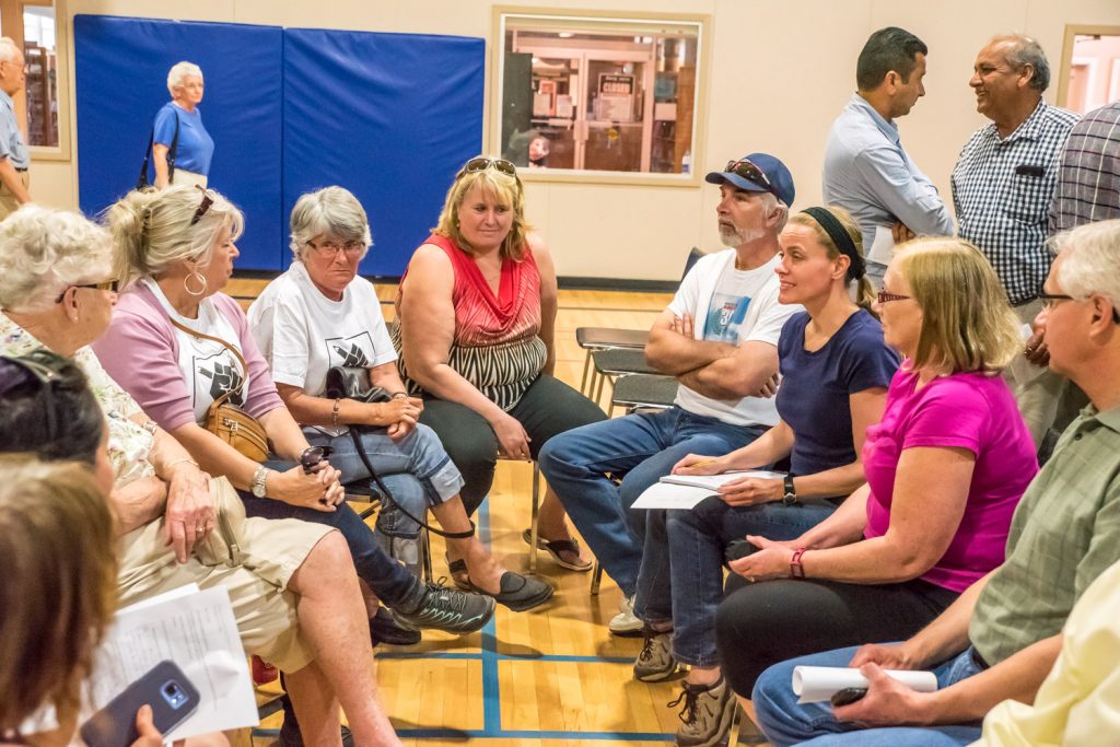 Participants broke off into smaller groups for "table sessions" where they discussed what they would like to see in a future Osoyoos community school. (Richard McGuire photo)