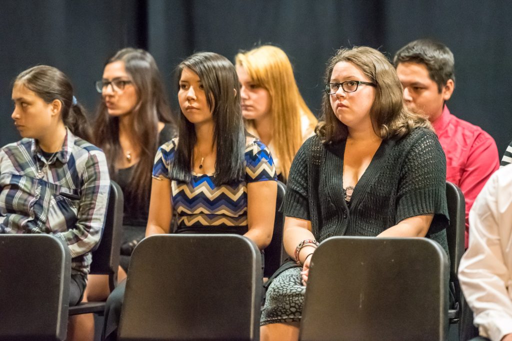 Some of the graduates are seated on stage as ceremonies begin. In total there were four Aboriginal grads from Osoyoos Secondary School, 22 from Southern Okanagan Secondary School, and 16 from Similkameen Elementary Secondary School. (Richard McGuire photo)