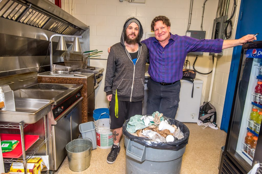 Former Tranquility Cafe employee Curtis Armstrong (left) helped Coyotes owner Randy Bedard clean up the concession at the arena last week after David Taylor left it in a mess. Bedard has taken Armstrong on as an employee in October and plans to give him a contract to run the concession starting in November. (Richard McGuire photo)