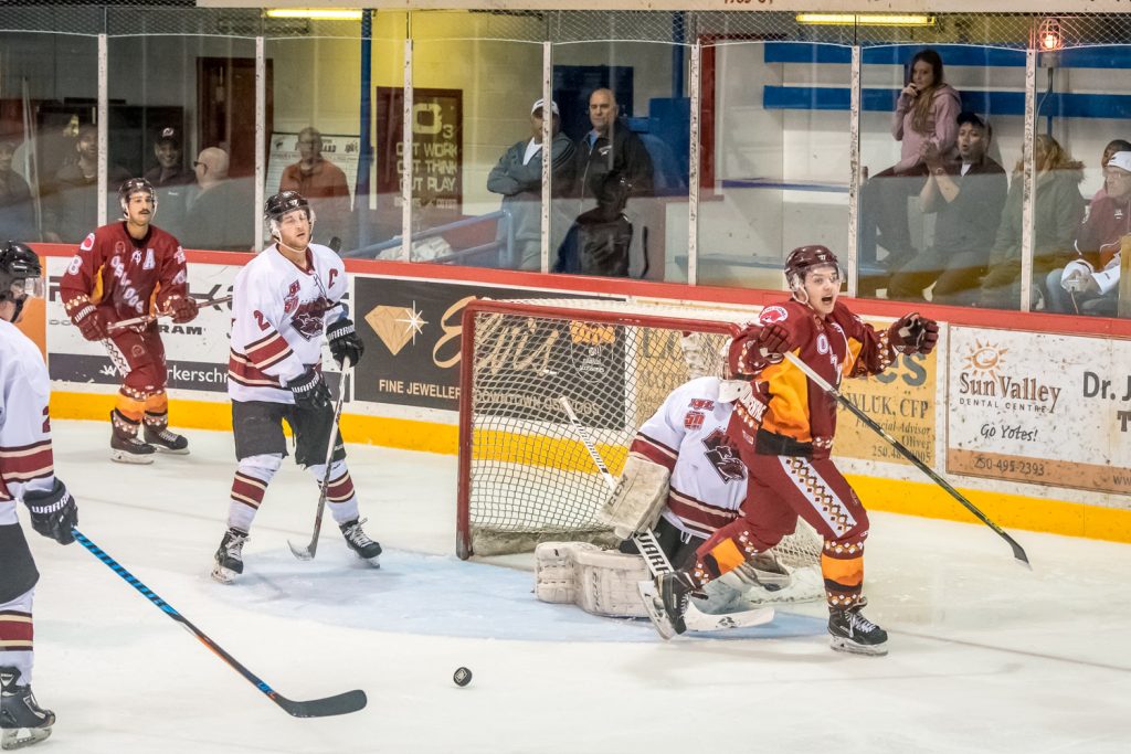Austin Cleaver skates away triumphantly after teammate Colin Bell scored his second goal Saturday night in an 8-0 victory over Princeton. (Richard McGuire photo)