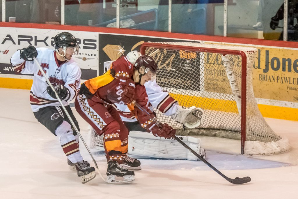 Sam Reinholt had Princeton backup goalie Bobby Milligan virtually to himself when he got a breakaway late in the second period Saturday. He didn't manage to get a shot away as Princeton player Chad Kimmie managed to thwart him. Milligan took over in net after Chandler Billinghurst let in his sixth goal. (Richard McGuire photo)