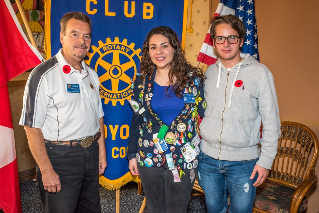 Nina Oliveira (centre) was guest speaker at the Rotary Club of Osoyoos on Thursday where she talked about her experience as an "outbound" exchange student in France. At right is "inbound" exchange student Carlo Geat, from Trento, Italy. At left is Brian Rawlings, president of the Rotary Club of Osoyoos. (Richard McGuire photo)