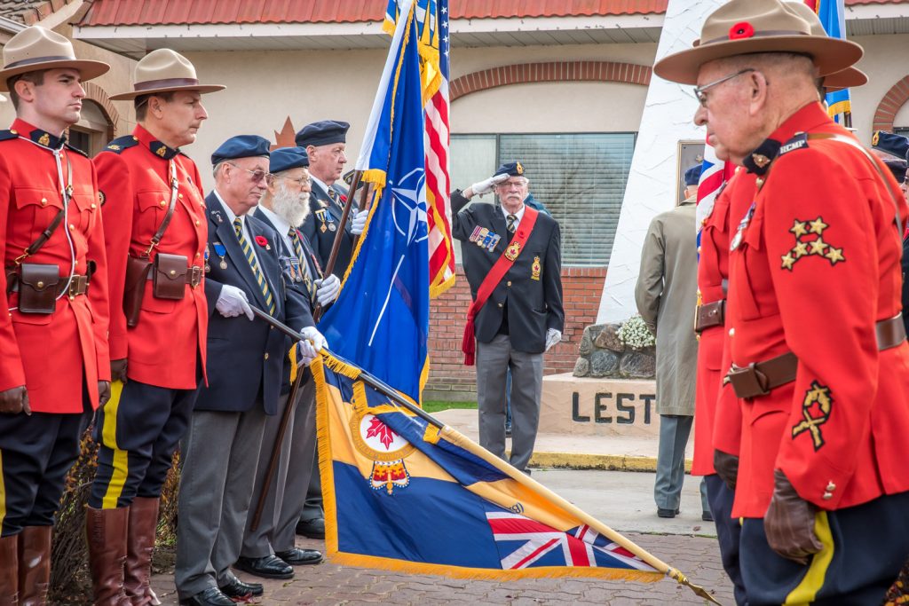 Sergeant-at-Arms Lew Taylor salutes following Last Post during a smaller Remembrance Day service at the cenotaph. (Richard McGuire photo)