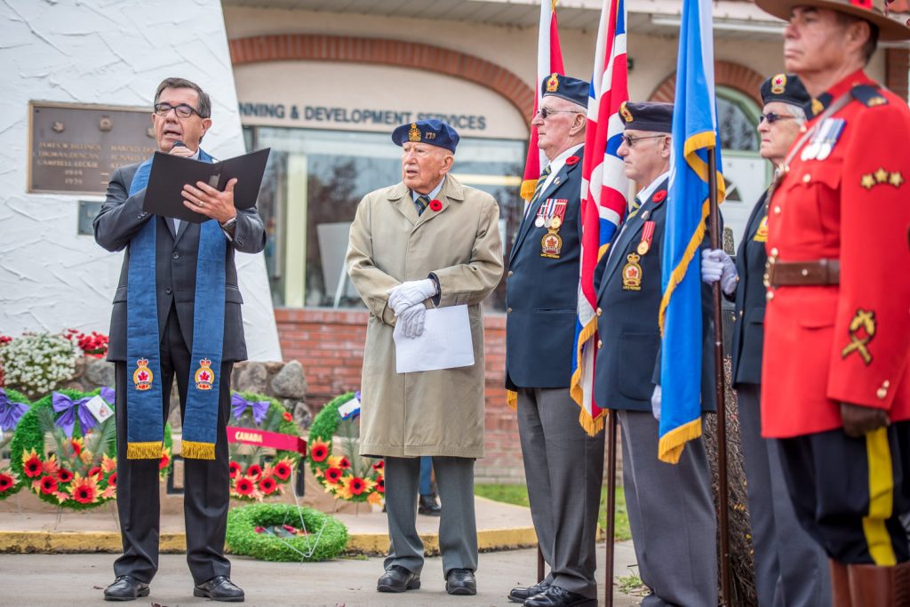 Rev. Steve Hershey gives the benediction at the end of the cenotaph Remembrance Day service. (Richard McGuire photo)