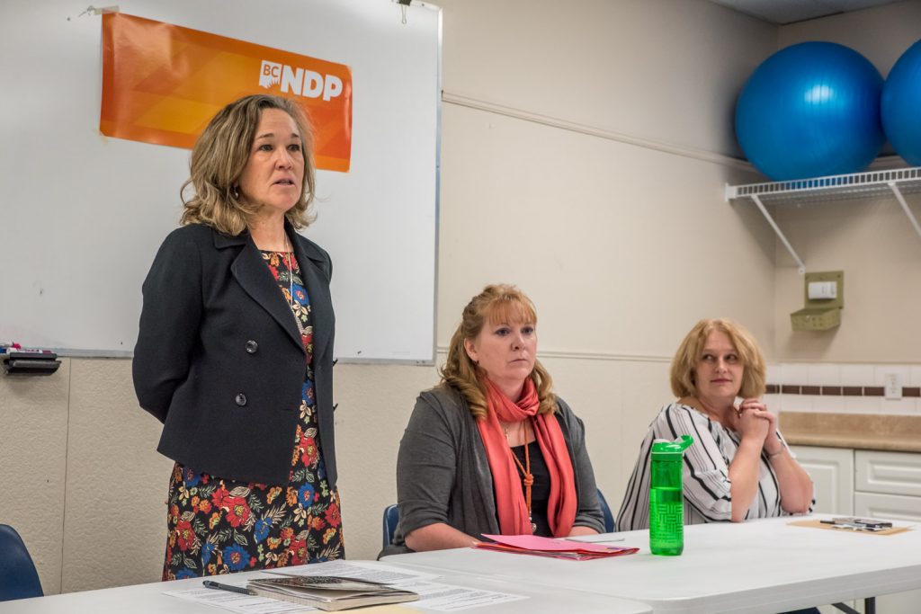 Colleen Ross (left) speaks to NDP members before the vote at Sunday's nomination meeting. To the right are Brenda Dorosz and riding association president Rhonda Bruce. (Richard McGuire photo)