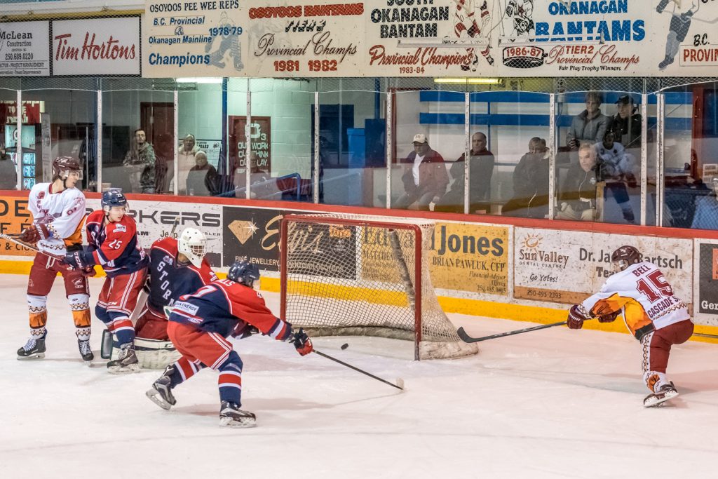 Colin Bell (right) had an open net, but the angle was too sharp and the puck just slid along the goal line. (Richard McGuire photo)
