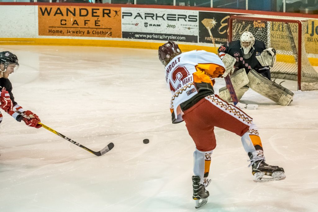 Sam Reinbolt fired a short from in front of the Sicamous net to score the Coyotes' fourth goal early in the second period. (Richard McGuire photo)