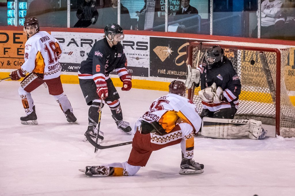 Colin Bell fired the puck from low down at close range into the upper right corner of the net, scoring the Coyotes' sixth goal. (Richard McGuire photo)