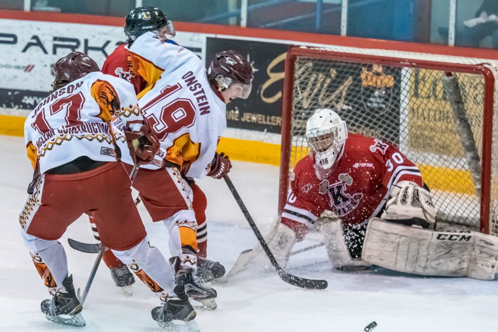 Hunter Johnson and Connor Onstein keep up the pressure on Kelowna goalie Brandon Gaucher in the second period Saturday night. Neither team managed to score that period. (Richard McGuire photo)