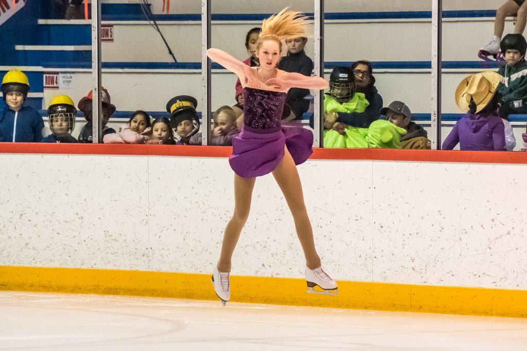 Laura Devries, who is in the Star 4 Competition Program, does a jump while skating solo. (Richard McGuire photo)