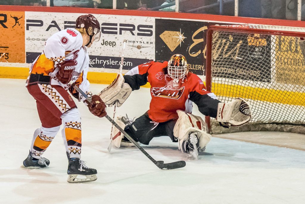 Ryan Roseboom takes the puck right to Chase goalie Nic Bruyere's doorstep. He didn't score this time, but a couple minutes later Roseboom scored unassisted to make it 2-0 on Saturday. (Richard McGuire photo)