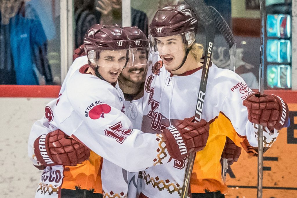 Colin Bell, Judd Repole and Ryan Roseboom celebrate after Roseboom scores unassisted to make Saturday's game 2-0. (Richard McGuire photo)
