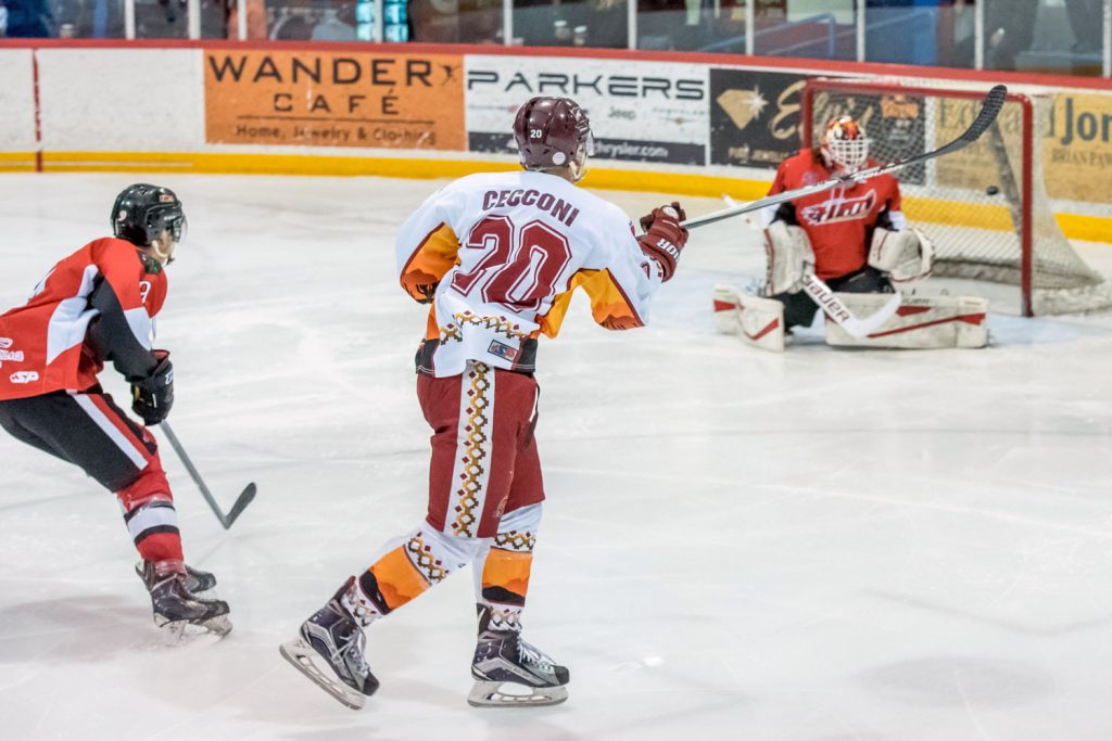 Bryson Cecconi skated in to shoot the puck through the legs of Chase goalie Nic Bruyere, scoring the Coyotes' second goal, tying the game, early in the second period. (Richard McGuire photo)