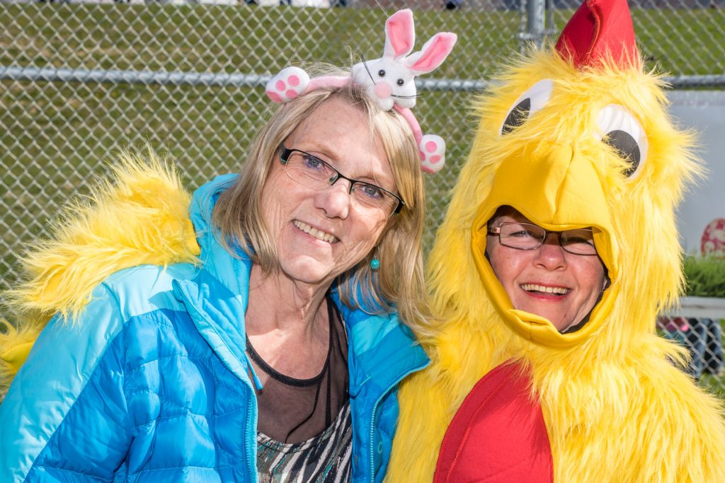 Birgit Arnstein (left) and Annette Star were among the Osoyoos Festival Society volunteers helping out at the Easter egg hunt during Easter Eggstravaganza. (Richard McGuire photo)