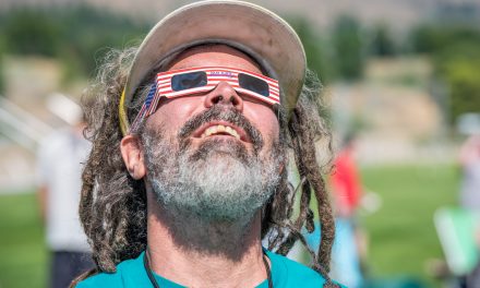 Viewing glasses in short supply, but people share, improvise to watch eclipse at Desert Park