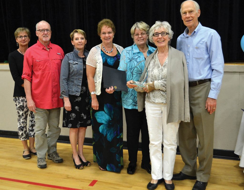 The Osoyoos Refugee Committee was awarded for outstanding volunteer project of the year at the town's annual volunteer awards in April for their efforts to support the Tabanjat family, Syrian refugees, as they settle in Osoyoos. Committee members who attended the ceremony include (left to right) Deb Holoboff, Don Blair, Leslee Blair, Marie Therrien, Gail Cornish, Vera Ryan, Michael Ryan. Other members of the original Steering Committee not present include Eileen Hopkins, Larry Wold, Lisa Ondejko Calder, Raouf Garram, Wayne and Janet Marcotte, Sue Read, Joan Shirriff, Sousan Najmeh, Wallace Murphy, Claire Hillier, Lee Chic. Other volunteers were also involved in preparing and outfitting the home and others are now serving as ESL teachers, tutors, drivers, helpers and friends. (Trevor Nichols photo)
