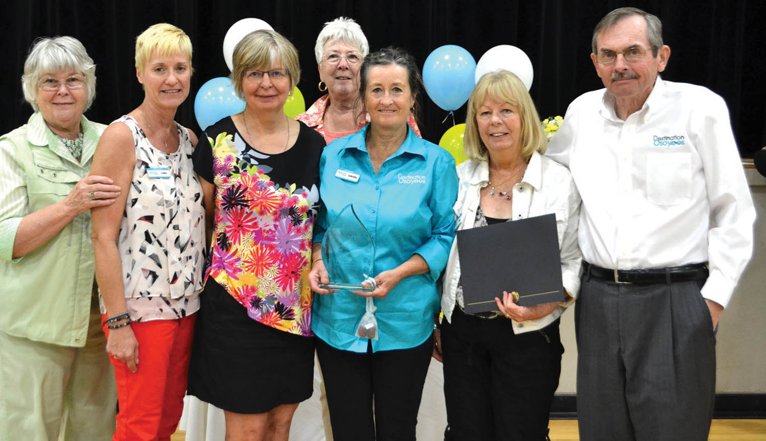 The Destination Osoyoos Ambassador Team won for outstanding community group of the year at the 15th annual Osoyoos Volunteer Appreciation Awards ceremony held this past Saturday afternoon at the Sonora Community Centre. Members of the victorious Destination Osoyoos ambassador team include (left to right) Gloria Ellingson, Karen Somerset, Candy Anders, Gail Scott, who is the current managing director of Destination Osoyoos, Samarra Lypka, Terrilyn Mandalik and Gordon MacIvor. Mayor Sue McKortoff and members of town council hand out dozens of certificates to a seemingly endless line of volunteer organizations and community groups active in Osoyoos. “You are all individuals with a sense of personal responsibility and civic pride. Your commitment to reach beyond yourselves helps to build a true sense of community in Osoyoos,” said McKortoff. The event attracted another large crowd of roughly 200 volunteers, who enjoyed a nice luncheon before the awards were handed out. (Trevor Nichols photo)