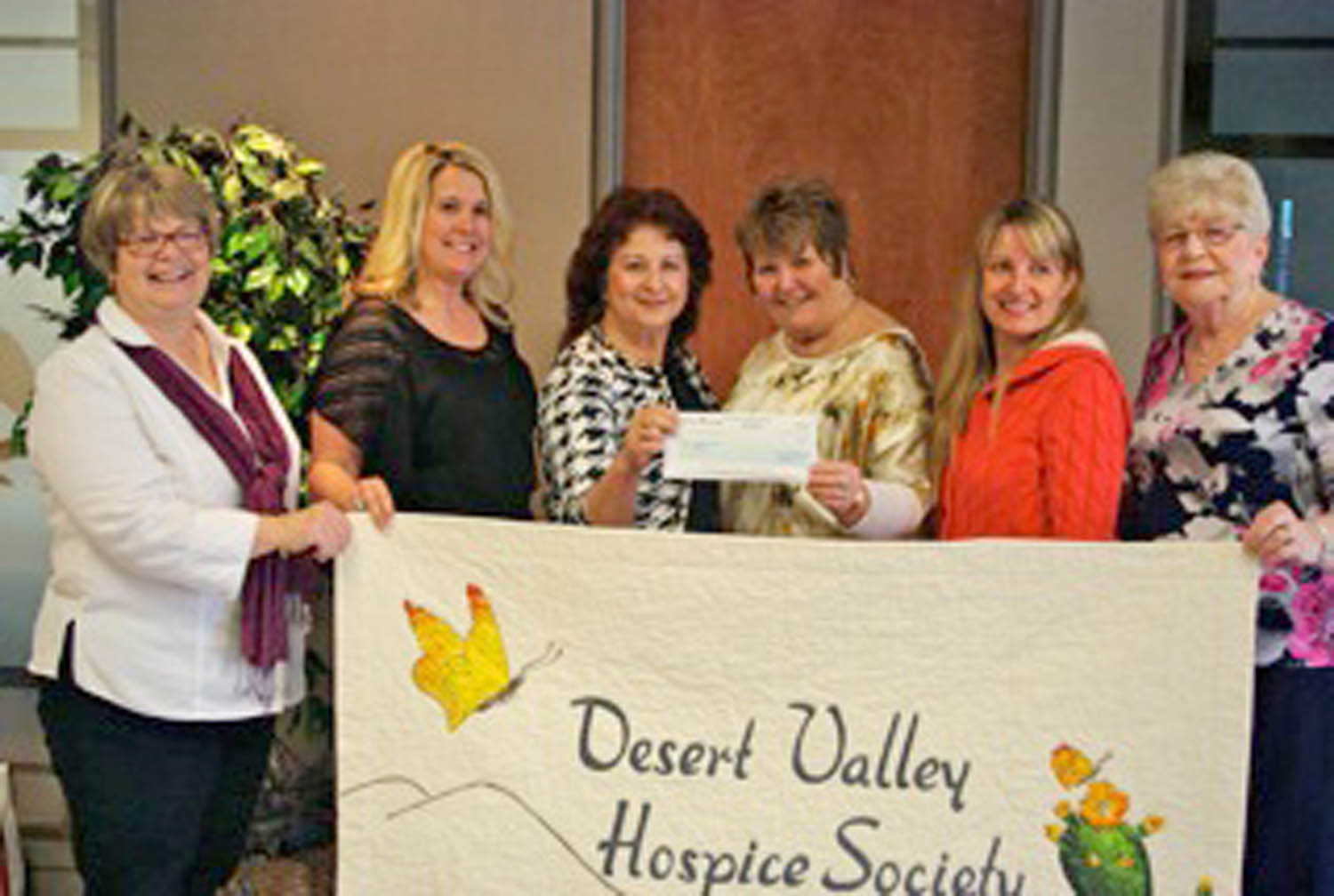 The Desert Valley Hospice Society gratefully accepts a donation of $1000 from Interior Savings in support for their annual Hike for Hospice, being held on Sunday, May 4 at Lion’s Park in Oliver. All of the proceeds from the hike will be used to provide hospice palliative care to clients in Osoyoos and Oliver who are in need of end-of-life services. From left are Susan Capyk, Lisa Waines, Maria Ferreira, Cheryle King, Tracy Houle and Trudy Demorest. Waines and Ferreira work at Interior Savings in Oliver, while the other four women volunteer with the hospice society. (Photo supplied)
