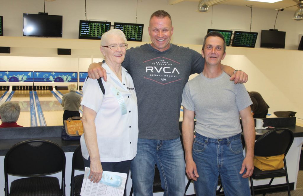 Kobau Lanes in Osoyoos is back in business more than 21 months after a devastating fire gutted the building on Canada Day, 2015. The bowling alley opened just in time for the annual Osoyoos Golden Age Jamboree. Owner Dan Tarasewich (centre) is joined by Golden Age Jamboree organizer Betty Sarazin and assistant manager Ron Ihloff. (Keith Lacey photo)
