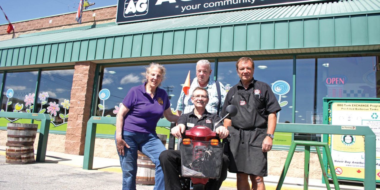 Oliver Kiwanis donates scooter to AG Foods for use of mobility impaired