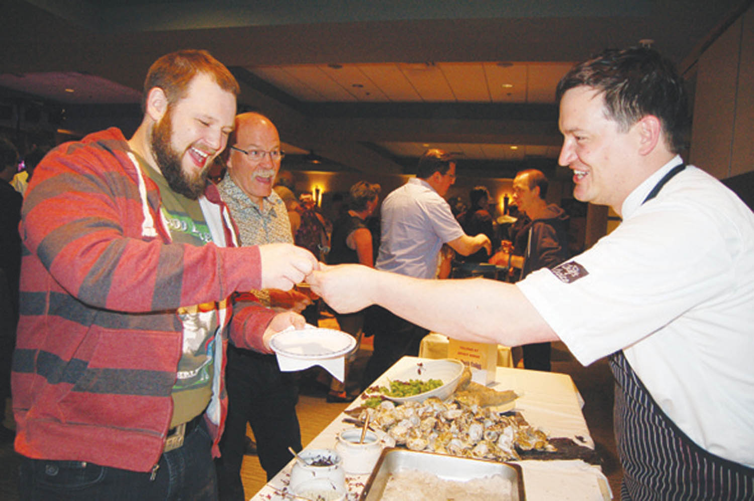 Executive chef Jamie Hertz handed out oysters as fast as he could shuck them at the SOCC Oyster Brew and Beast Bash at Spirit Ridge Vineyard Resort on April 25. (Erin Christie photo)