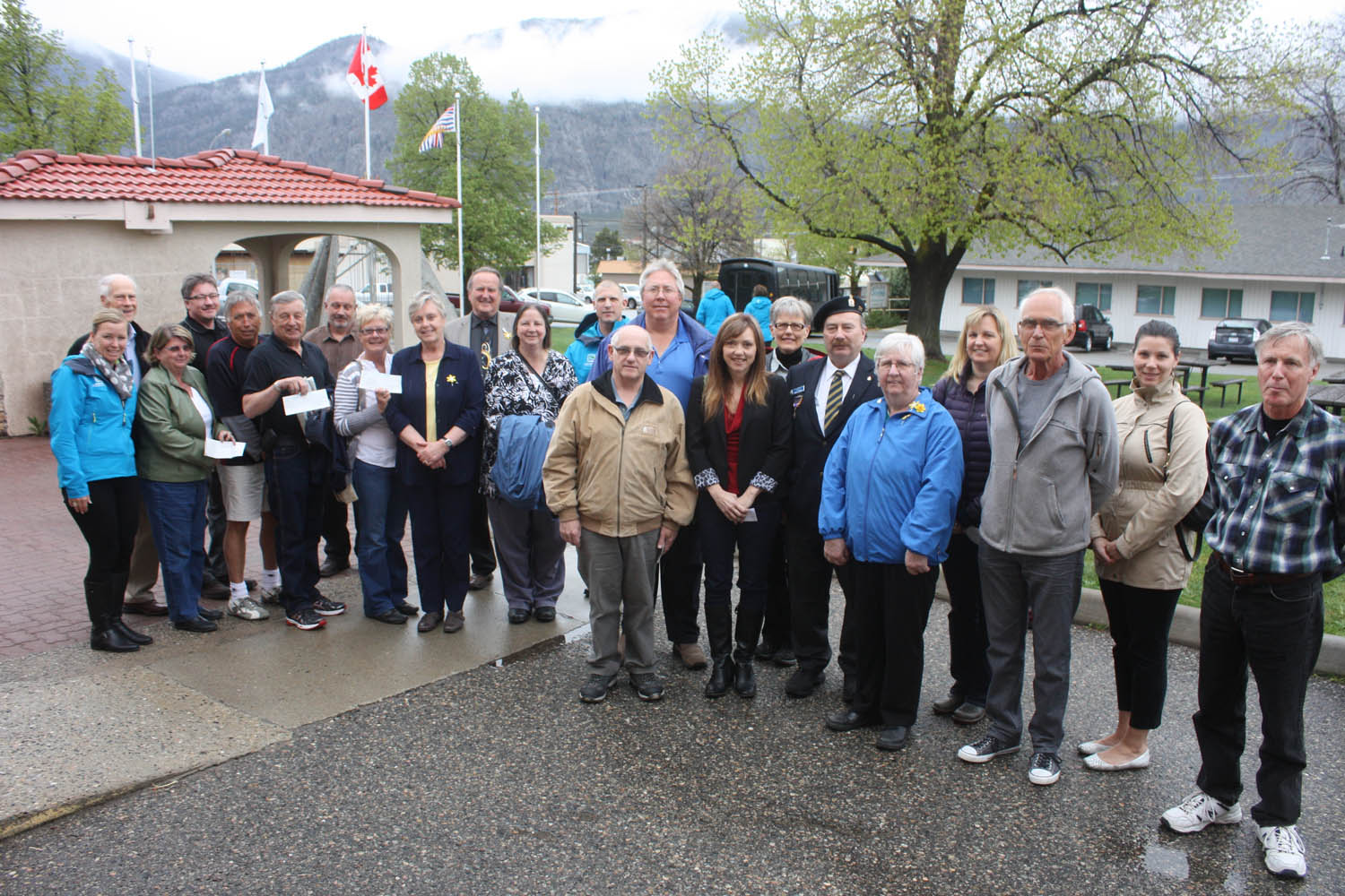 Representatives from more than a dozen non-profit Osoyoos and area groups, charities and organizations attended a recent meeting of Town of Osoyoos council to officially pick up their cheques after being awarded annual funding as part of council’s annual Community Grant and Aid program. Mayor Stu Wells and members of council posed with grant recipients outside of town hall. The Community Grant and Aid program handed out more than $47,000 in funding to 16 groups that had requested more than $60,000 in funding. (Keith Lacey photo)