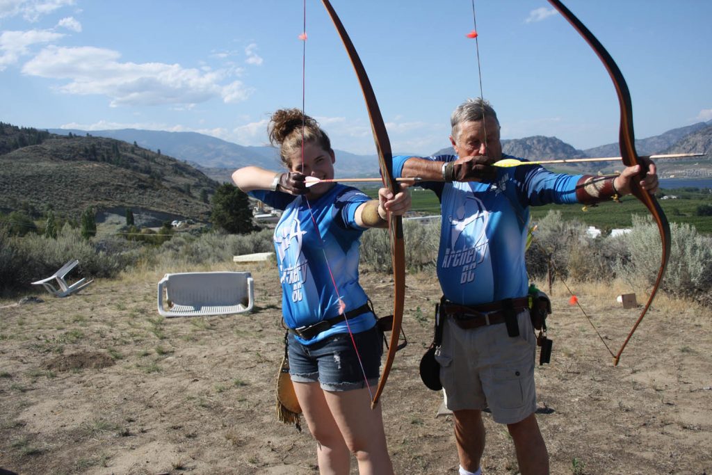Miranda Sparkes (left) placed first at national archery championships. Her mentor, Brock Paton, took silver in his category. (Keith Lacey photo)