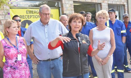 Premier praises volunteers during visit to Oliver, while condemning drone operator