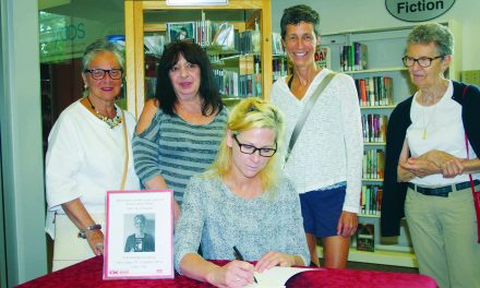 Author urges other writers to pursue their passion during book signing at Osoyoos