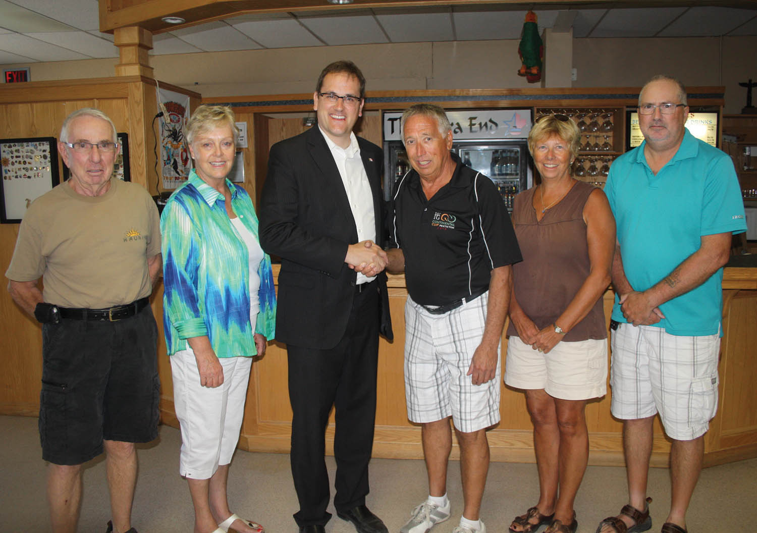 The Osoyoos International Curling Club will undergo a major facelift over the next couple of years after club members raised more than $22,000, which was matched by federal infrastruture funding announced last week by Dan Albas, MP for Okanagan-Coquihalla. On hand for the presentation were (from left) club board member Gordon James, Osoyoos Mayor Sue McKortoff, Albas, club president John Katerenchuk and board members Betty Steinbart and Don Peterson. (Keith Lacey photo)