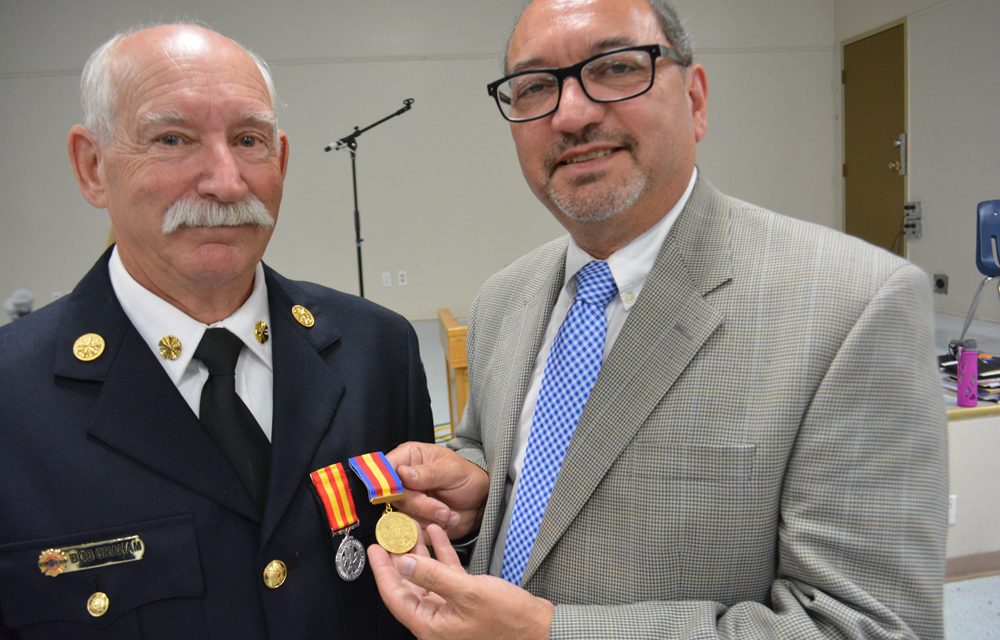Fire chief honoured with long service medal