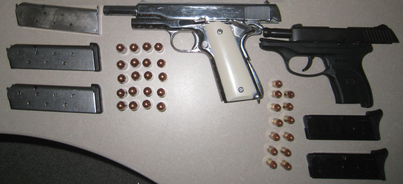 These handguns were seized at the Cascade port of entry on July 21, the same day that another loaded handgun was seized at the Osoyoos port of entry. These were found under the sleeping bed of a travel trailer during a vehicle examination and were seized. (Canada Border Services Agency)
