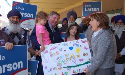 Clark greets one of her youngest supporters