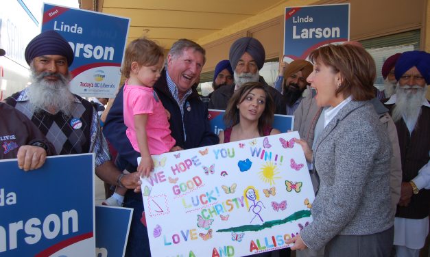Clark greets one of her youngest supporters