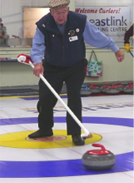 Long-time curler Pete Wicklund melts the ice