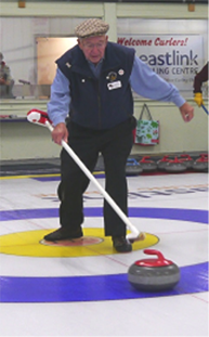 Long-time curler Pete Wicklund melts the ice