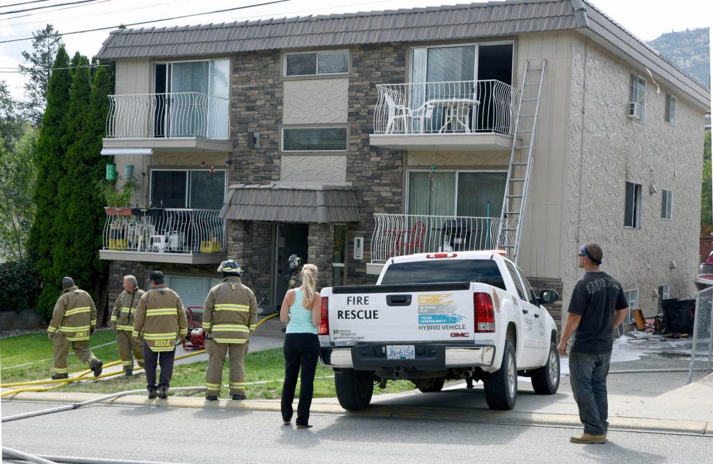 Fire broke out Wednesday afternoon in an apartment building on 89th Street in Osoyoos. The fire is believed to have started in a second floor apartment in the six-plex and no injuries have been reported. (Richard McGuire photo)