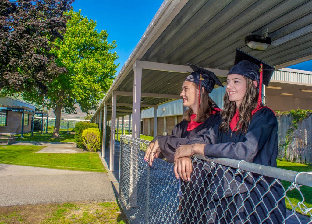 Proud graduates Katrina Hahn and Alyssa Macor. (Dan Walton photo)