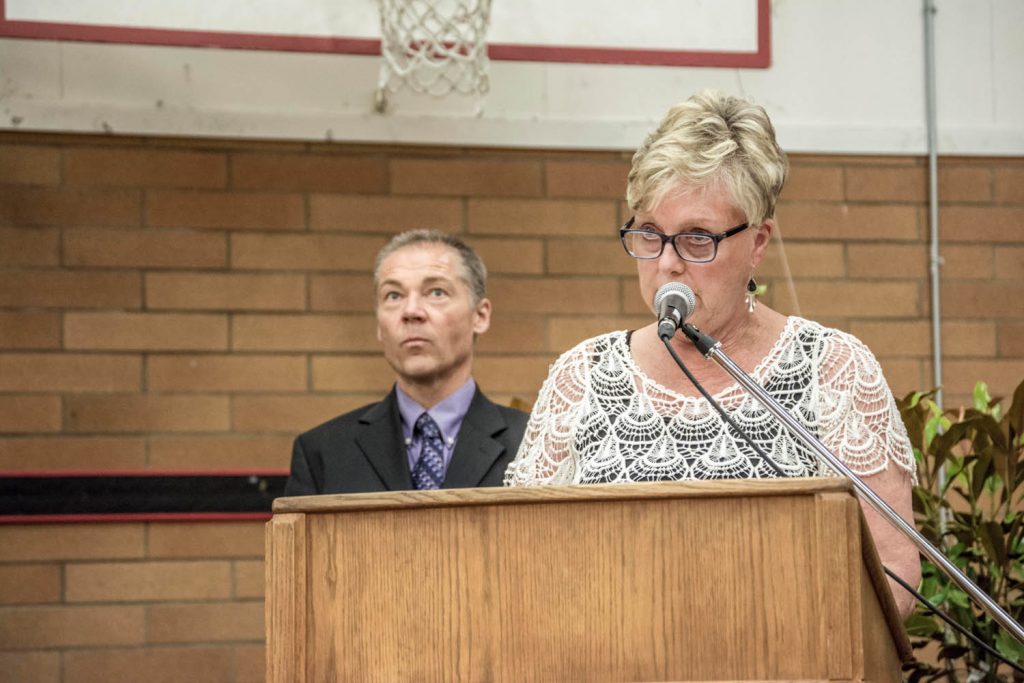 Mayor Sue McKortoff speaks at the Osoyoos Secondary School graduation while Principal Mike Safek looks on. (Dan Walton photo)