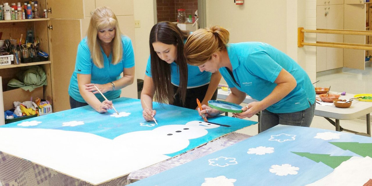 Interior Savings employees offering to get their hands dirty