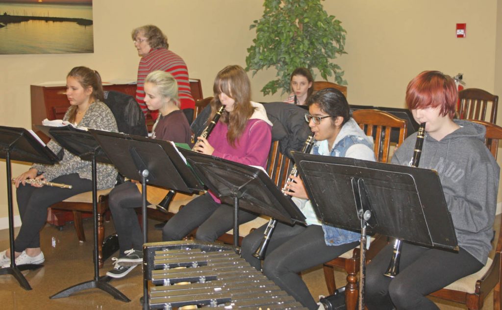 Thanks to eight dedicated and talented young musicians and retired Osoyoos Elementary School music teacher Anne Murseli, the Osoyoos Secondary School Concert Band has managed to survive. Murseli (on piano) and the concert band members performed at the former Cactus Ridge retirement residence over the Christmas holiday season. (Keith Lacey photo)
