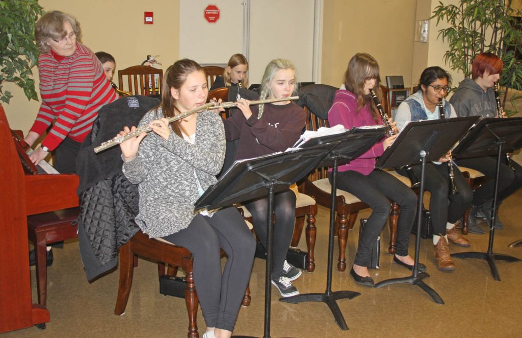 Thanks to eight dedicated and talented young musicians and retired Osoyoos Elementary School music teacher Anne Murseli, the Osoyoos Secondary School Concert Band has managed to survive. Murseli (on piano) and the concert band members performed at the former Cactus Ridge retirement residence over the Christmas holiday season. (Keith Lacey photo)