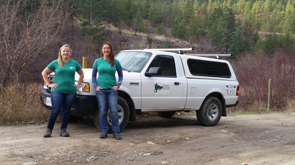 Alyson Skinner (left) & Lia McKinnon of the Okanagan Similkameen Stewardship Society stand beside the new-to-them truck that was purchased with the help of a $5,000 grant from the Community Foundation of the South Okanagan Similkameen. (Photo supplied)