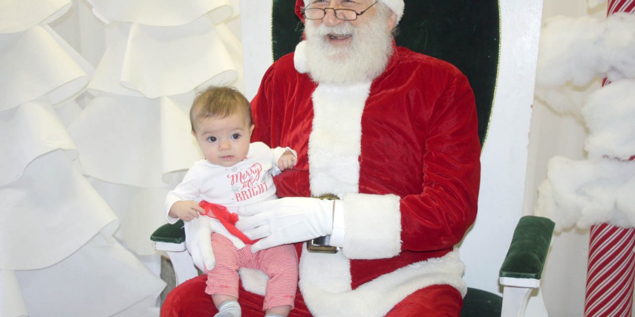 Hundreds of residents take in Breakfast with Santa event