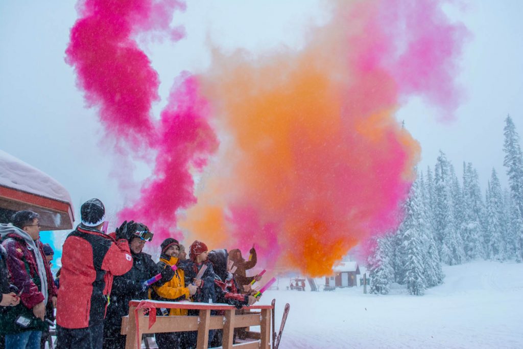 A gleeful crowd fired off coloured powder cannons at the base of Baldy Mountain Ski Area last Friday as part of the resort’s grand reopening celebration. (Dan Walton photo)