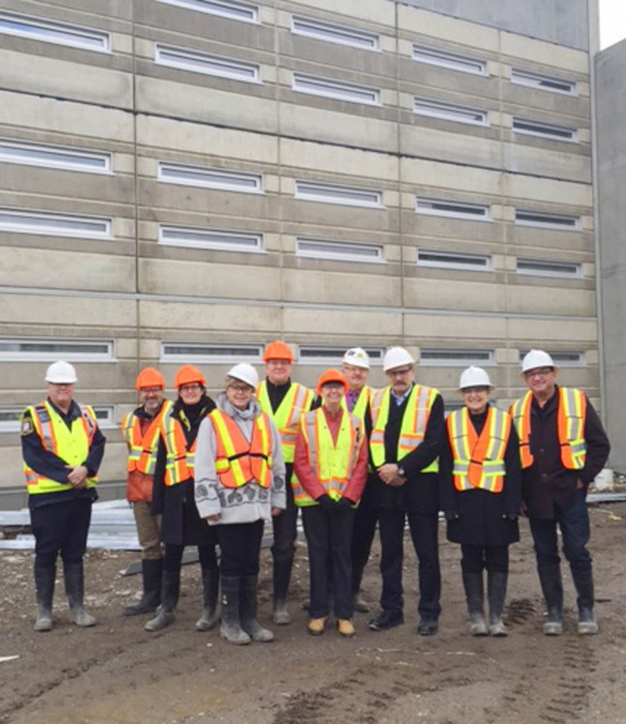 Mike Morris (third from right) and Osoyoos Mayor Sue McKortoff (fourth from left) were part of a group of local dignitaries who received an extended tour of the new South Okanagan Correctional Centre being built near Oliver recently. (Lyonel Doherty photo)