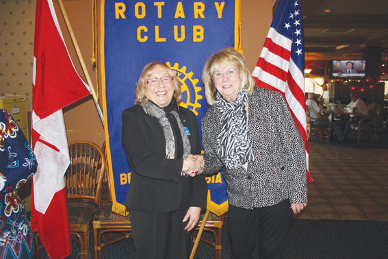 Carol Youngberg (right), the newly-elected Town of Osoyoos councillor, was the special guest speaker of the Osoyoos Rotary Club during its weekly Thursday luncheon last week. Even though she has had to step down as the leader with the Desert Park Exhibition Society, Youngberg told Rotarians that she believes the future for Desert Park looks bright. Plans are being put in place to renovate the grandstand and repair the roof of the grandstand building, said Youngberg, who also informed the crowd of how busy she has been and how she has enjoyed being on council since being elected in November. KEITH LACEY