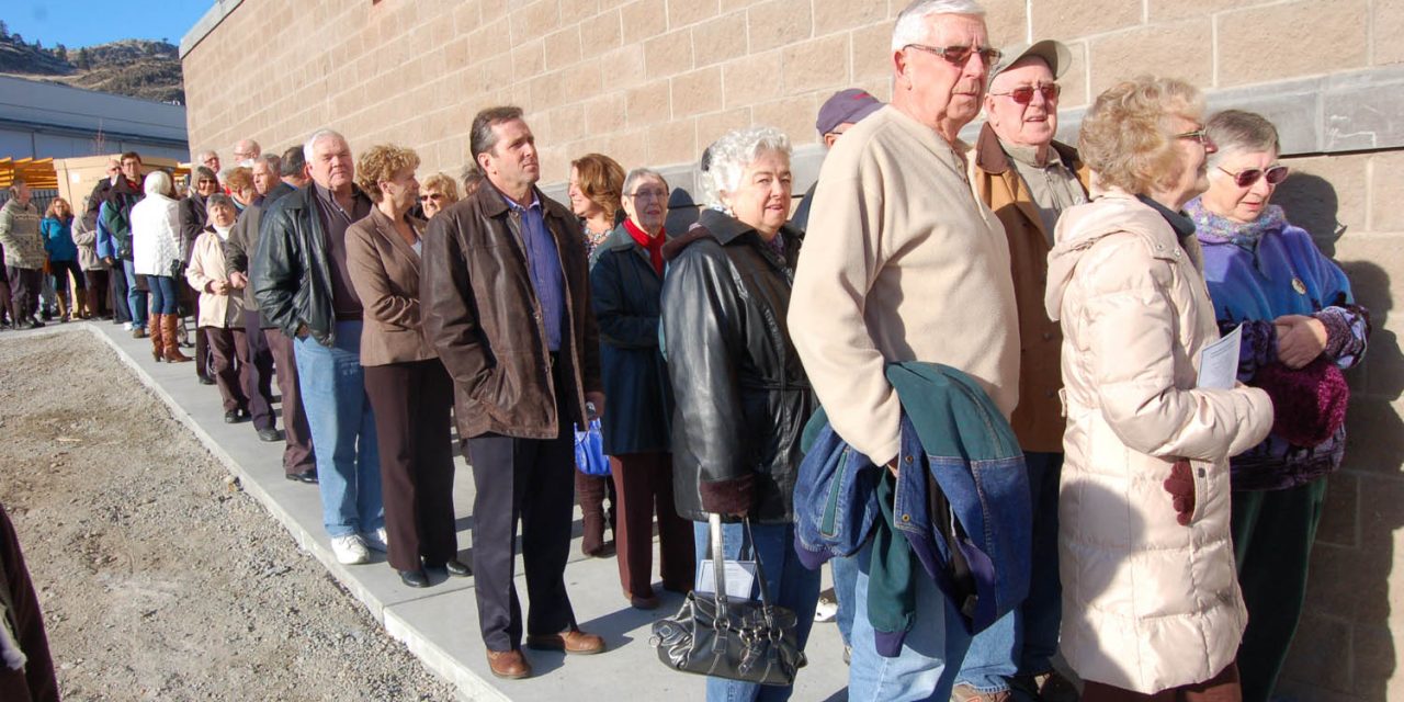 Large crowds turn out as rebuilt high school rises from the ashes after fire